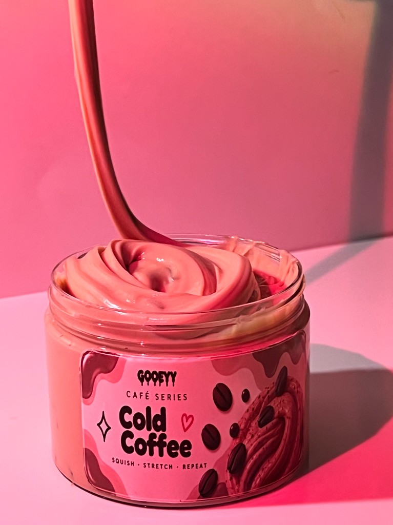Cold Coffee slime being poured from the jar