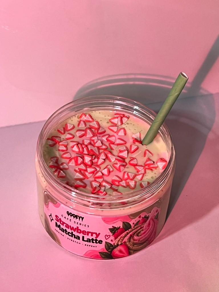 Strawberry Matcha Latte slime jar with a straw